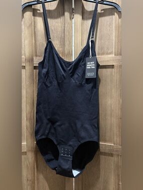 NWT. Women's Black Shapewear Bodysuit with Snap Closure.